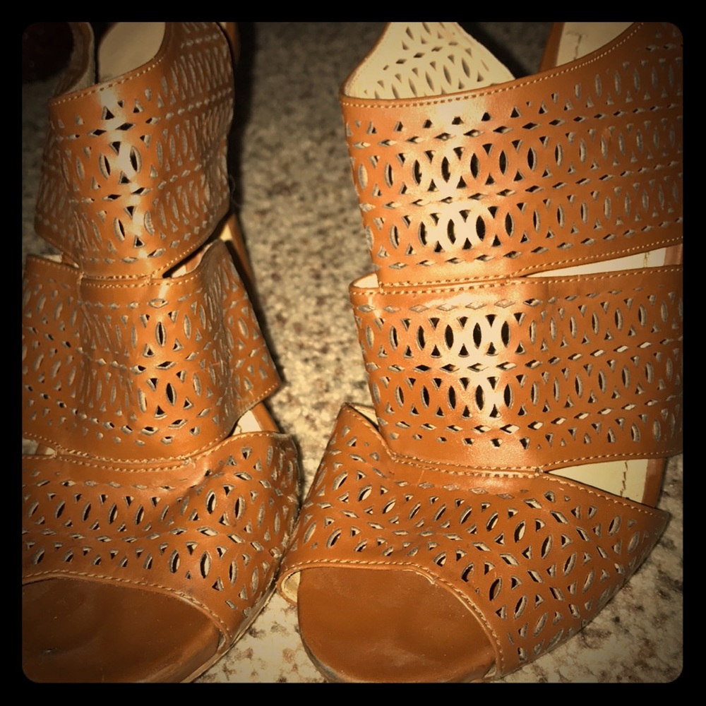 Tan caged laser cut heels